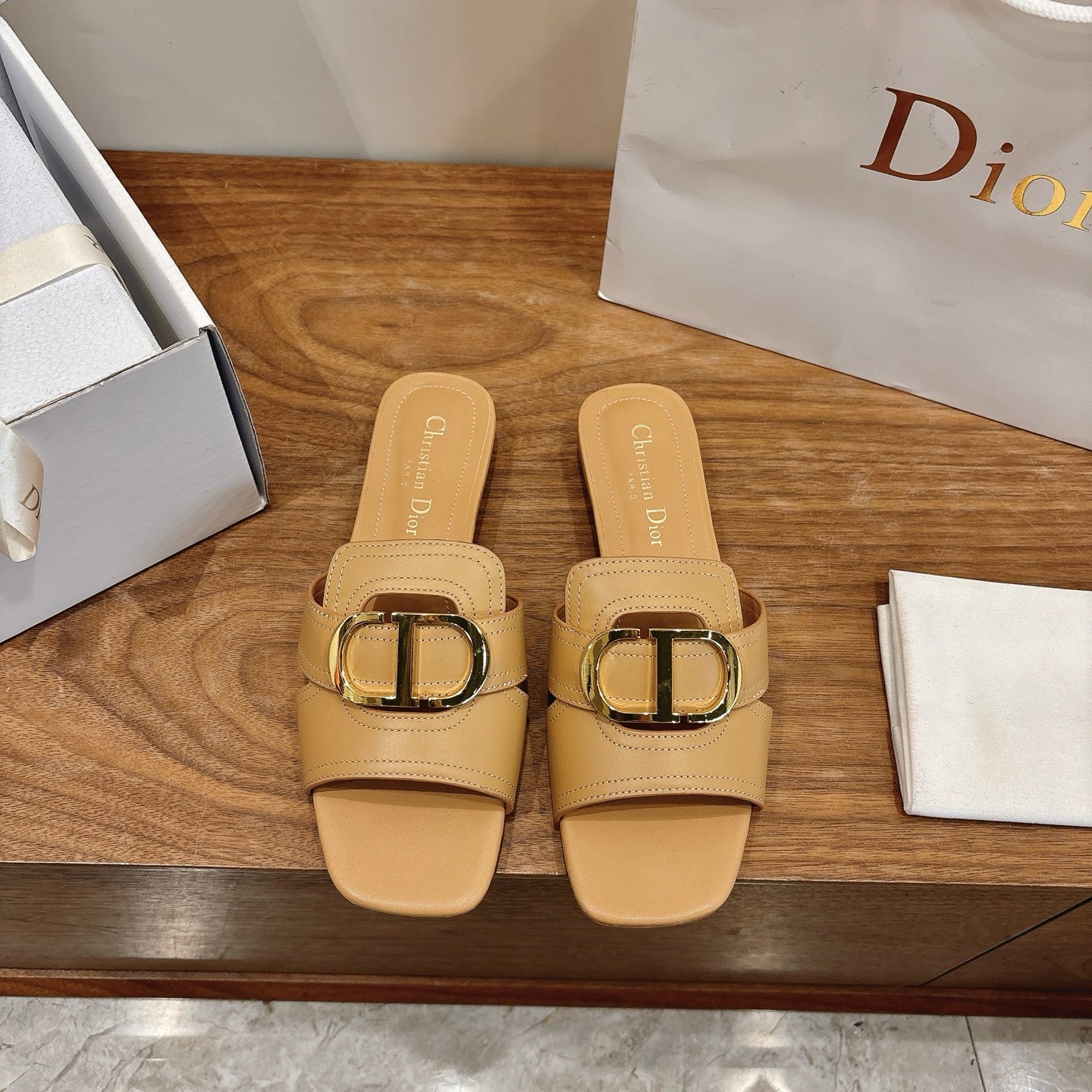 CD Montaigne Slides Buckle Beige Calfskin Leather 862368
