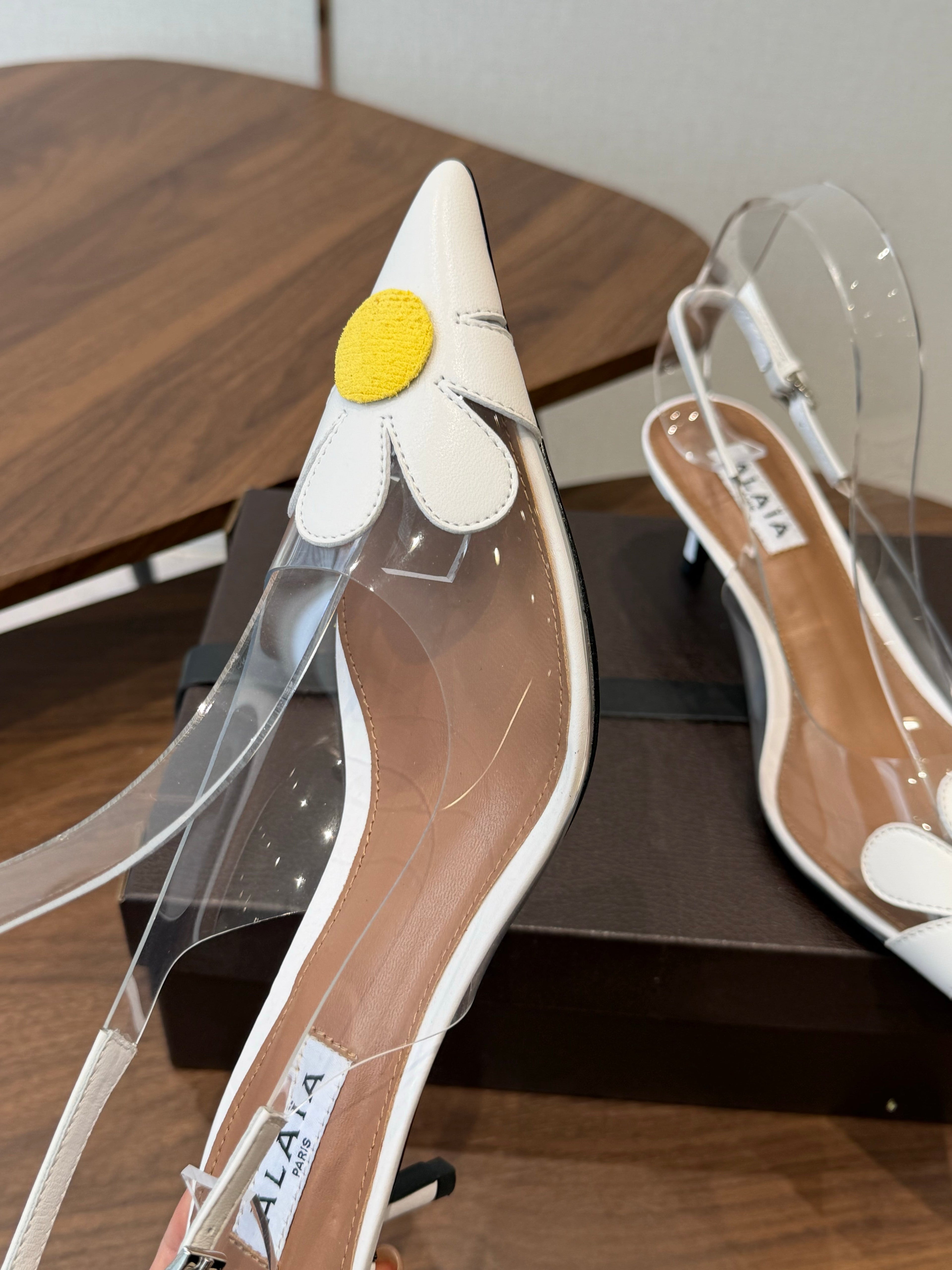Alaia Daisy Slingback Pumps 55mm Cowhide Clear PVC 889950